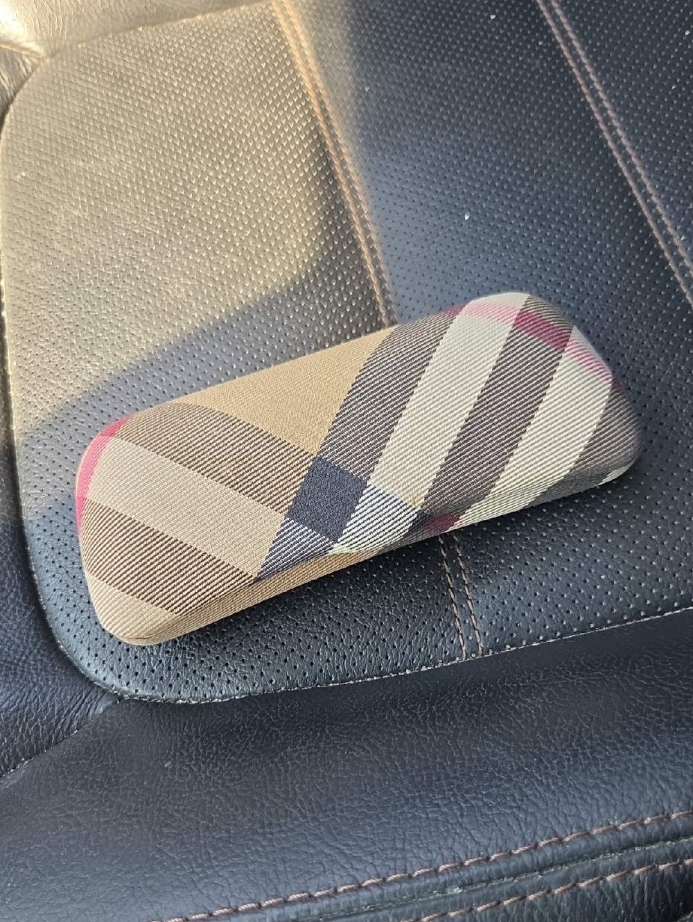 Burberry glasses case.